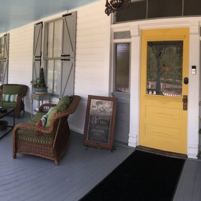 JT B&B porch entrance. Enjoy a taste of the south with this large front porch while sipping a cup of coffee.